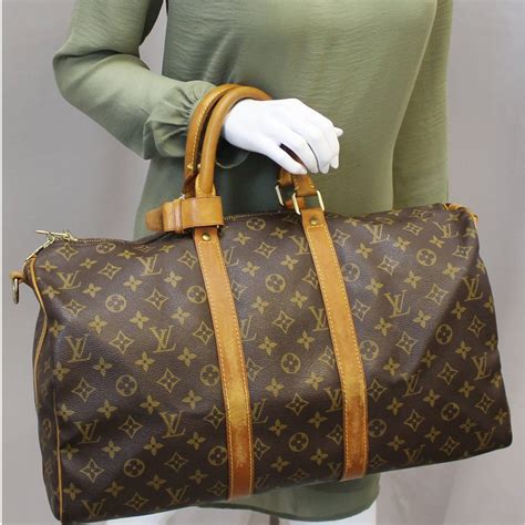 fake louis vuitton bags cost|authentic louis vuittion duffle bag.